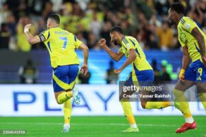 RIYADH, SAUDI ARABIA - MARCH 14: Cristiano Ronaldo of Al Nassr celebrates after scoring the 1st goal during the Saudi pro League match between Al Nassr v Al Kholood at Al-Awwal Park on March 14, 2025 in Riyadh, Saudi Arabia. 